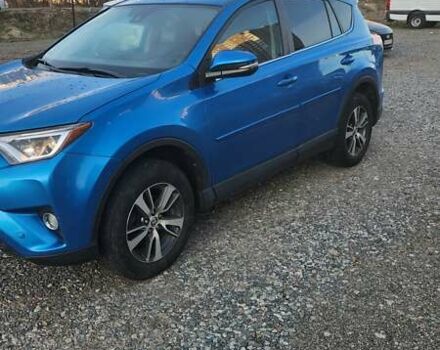 Синий Тойота РАВ 4, объемом двигателя 2.49 л и пробегом 124 тыс. км за 19500 $, фото 1 на Automoto.ua