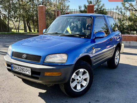 Синий Тойота РАВ 4, объемом двигателя 2 л и пробегом 437 тыс. км за 4999 $, фото 1 на Automoto.ua
