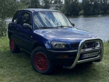 Синій Тойота РАВ 4, об'ємом двигуна 2 л та пробігом 328 тис. км за 4200 $, фото 1 на Automoto.ua