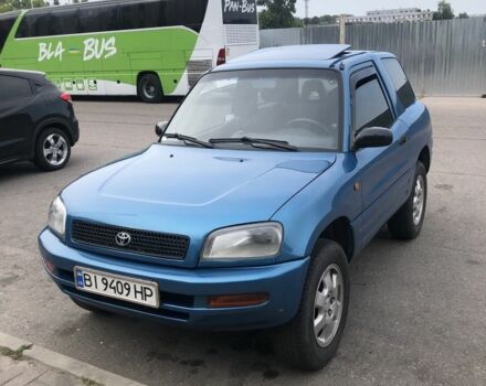 Синий Тойота РАВ 4, объемом двигателя 2 л и пробегом 385 тыс. км за 4200 $, фото 1 на Automoto.ua