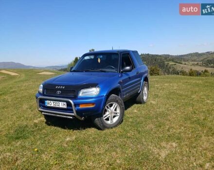 Синий Тойота РАВ 4, объемом двигателя 2 л и пробегом 337 тыс. км за 5300 $, фото 1 на Automoto.ua