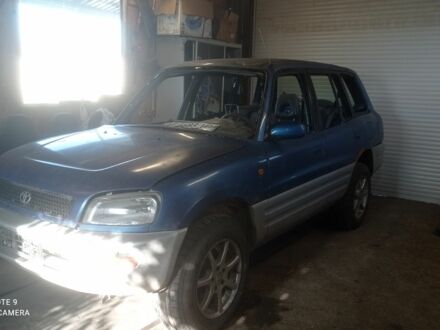 Синий Тойота РАВ 4, объемом двигателя 2 л и пробегом 200 тыс. км за 2100 $, фото 1 на Automoto.ua