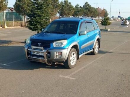 Синий Тойота РАВ 4, объемом двигателя 2 л и пробегом 226 тыс. км за 7800 $, фото 1 на Automoto.ua