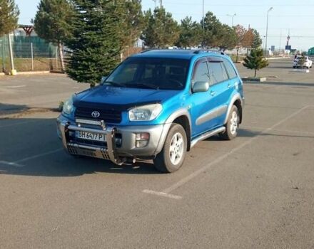Синий Тойота РАВ 4, объемом двигателя 2 л и пробегом 226 тыс. км за 7800 $, фото 1 на Automoto.ua