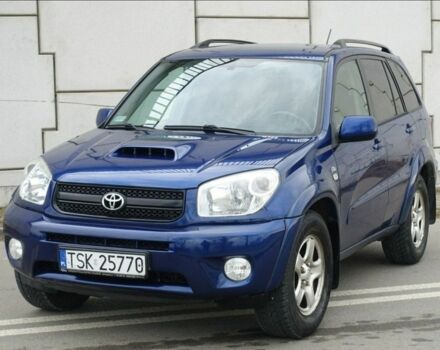 Синий Тойота РАВ 4, объемом двигателя 2 л и пробегом 243 тыс. км за 2200 $, фото 1 на Automoto.ua