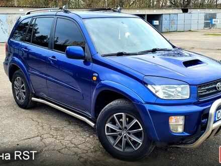 Синий Тойота РАВ 4, объемом двигателя 2 л и пробегом 260 тыс. км за 3500 $, фото 1 на Automoto.ua