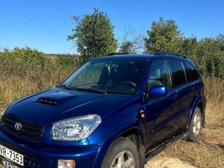 Синій Тойота РАВ 4, об'ємом двигуна 2 л та пробігом 188 тис. км за 1800 $, фото 1 на Automoto.ua