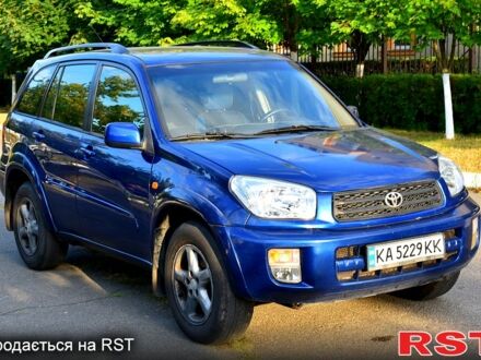 Синій Тойота РАВ 4, об'ємом двигуна 2 л та пробігом 249 тис. км за 5700 $, фото 1 на Automoto.ua