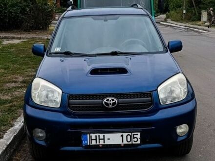 Синій Тойота РАВ 4, об'ємом двигуна 2 л та пробігом 255 тис. км за 3993 $, фото 1 на Automoto.ua