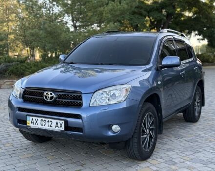 Синій Тойота РАВ 4, об'ємом двигуна 2 л та пробігом 124 тис. км за 12000 $, фото 1 на Automoto.ua