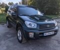 Зелений Тойота РАВ 4, об'ємом двигуна 2 л та пробігом 455 тис. км за 5798 $, фото 1 на Automoto.ua