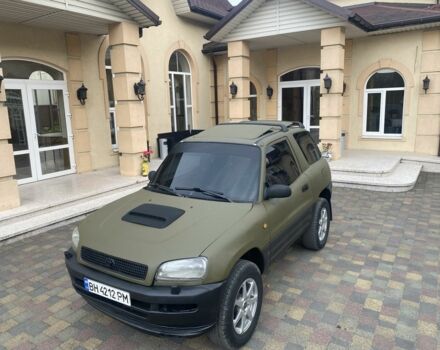 Зелений Тойота РАВ 4, об'ємом двигуна 2 л та пробігом 200 тис. км за 4200 $, фото 2 на Automoto.ua