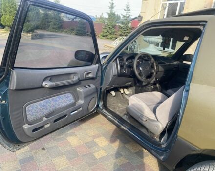 Зелений Тойота РАВ 4, об'ємом двигуна 2 л та пробігом 200 тис. км за 4200 $, фото 15 на Automoto.ua