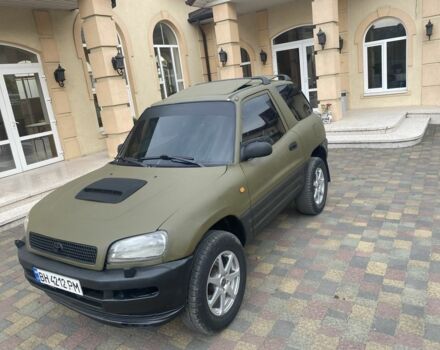 Зелений Тойота РАВ 4, об'ємом двигуна 2 л та пробігом 200 тис. км за 4200 $, фото 6 на Automoto.ua