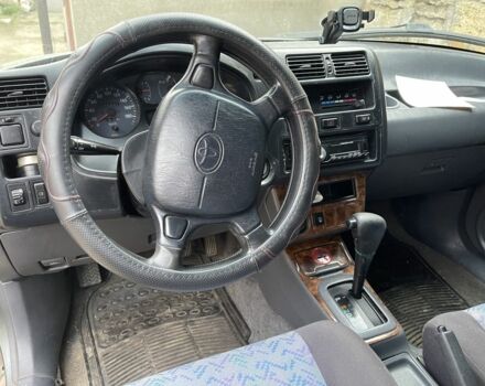 Зелений Тойота РАВ 4, об'ємом двигуна 2 л та пробігом 100 тис. км за 4500 $, фото 5 на Automoto.ua