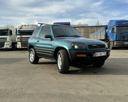 Зелений Тойота РАВ 4, об'ємом двигуна 2 л та пробігом 405 тис. км за 4999 $, фото 5 на Automoto.ua