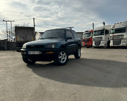 Зелений Тойота РАВ 4, об'ємом двигуна 2 л та пробігом 405 тис. км за 4999 $, фото 4 на Automoto.ua