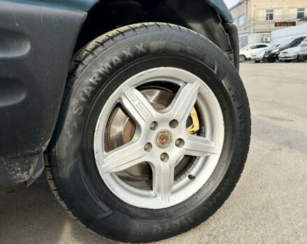 Зелений Тойота РАВ 4, об'ємом двигуна 2 л та пробігом 405 тис. км за 4999 $, фото 7 на Automoto.ua
