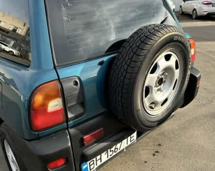 Зелений Тойота РАВ 4, об'ємом двигуна 2 л та пробігом 405 тис. км за 4999 $, фото 2 на Automoto.ua