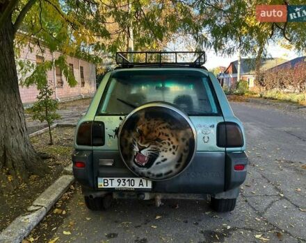 Зеленый Тойота РАВ 4, объемом двигателя 2 л и пробегом 400 тыс. км за 4900 $, фото 2 на Automoto.ua