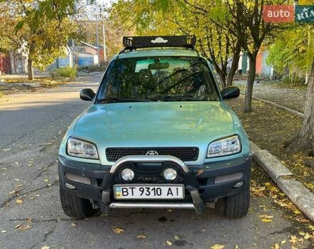 Зеленый Тойота РАВ 4, объемом двигателя 2 л и пробегом 400 тыс. км за 4900 $, фото 1 на Automoto.ua