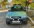 Зеленый Тойота РАВ 4, объемом двигателя 2 л и пробегом 400 тыс. км за 4900 $, фото 1 на Automoto.ua