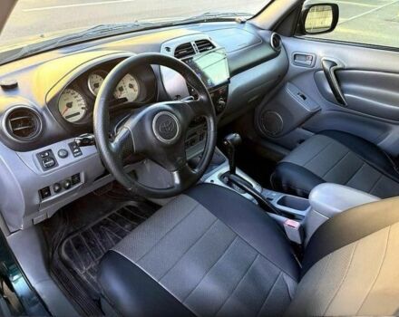 Зеленый Тойота РАВ 4, объемом двигателя 2 л и пробегом 256 тыс. км за 5800 $, фото 3 на Automoto.ua