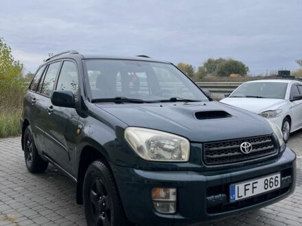 Зеленый Тойота РАВ 4, объемом двигателя 2 л и пробегом 350 тыс. км за 3900 $, фото 1 на Automoto.ua