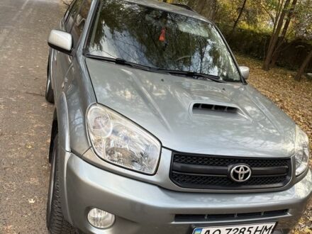 Зеленый Тойота РАВ 4, объемом двигателя 2 л и пробегом 390 тыс. км за 5800 $, фото 1 на Automoto.ua