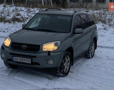 Зеленый Тойота РАВ 4, объемом двигателя 2 л и пробегом 240 тыс. км за 7500 $, фото 1 на Automoto.ua