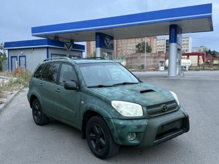 Зелений Тойота РАВ 4, об'ємом двигуна 2 л та пробігом 282 тис. км за 3200 $, фото 1 на Automoto.ua