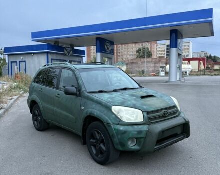 Зелений Тойота РАВ 4, об'ємом двигуна 2 л та пробігом 282 тис. км за 3200 $, фото 1 на Automoto.ua