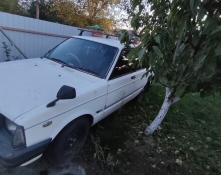 Белый Тойота Старлет, объемом двигателя 1 л и пробегом 209 тыс. км за 663 $, фото 2 на Automoto.ua