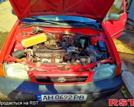 Красный Тойота Старлет, объемом двигателя 1.3 л и пробегом 380 тыс. км за 1500 $, фото 1 на Automoto.ua