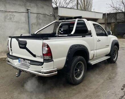 Белый Тойота Такома, объемом двигателя 2.7 л и пробегом 270 тыс. км за 9500 $, фото 3 на Automoto.ua