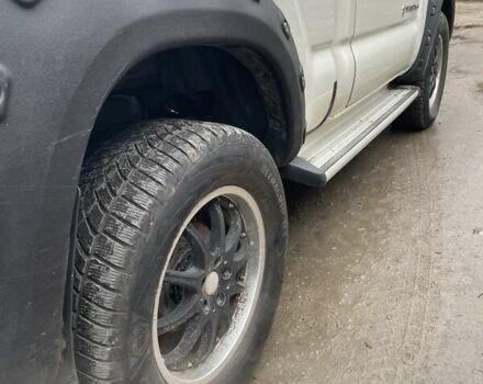 Белый Тойота Такома, объемом двигателя 2.7 л и пробегом 270 тыс. км за 9500 $, фото 5 на Automoto.ua