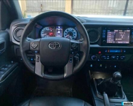 Белый Тойота Такома, объемом двигателя 2.7 л и пробегом 67 тыс. км за 14000 $, фото 8 на Automoto.ua