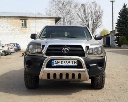 Бежевый Тойота Такома, объемом двигателя 4 л и пробегом 182 тыс. км за 11200 $, фото 1 на Automoto.ua