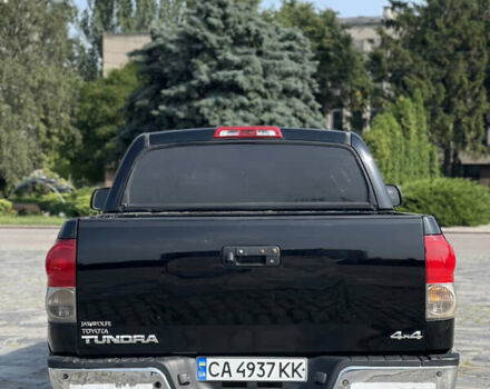 Черный Тойота Тундра, объемом двигателя 5.66 л и пробегом 330 тыс. км за 13600 $, фото 5 на Automoto.ua