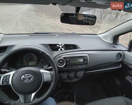 Білий Тойота Яріс, об'ємом двигуна 1 л та пробігом 136 тис. км за 5700 $, фото 1 на Automoto.ua
