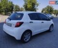 Белый Тойота Ярис, объемом двигателя 1.33 л и пробегом 240 тыс. км за 7500 $, фото 6 на Automoto.ua