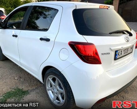 Белый Тойота Ярис, объемом двигателя 1.3 л и пробегом 240 тыс. км за 9000 $, фото 1 на Automoto.ua