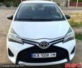 Белый Тойота Ярис, объемом двигателя 1.3 л и пробегом 240 тыс. км за 9000 $, фото 2 на Automoto.ua