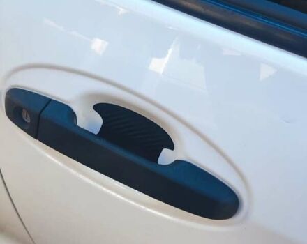 Белый Тойота Ярис, объемом двигателя 1.33 л и пробегом 244 тыс. км за 7000 $, фото 1 на Automoto.ua