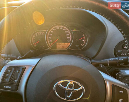 Білий Тойота Яріс, об'ємом двигуна 1.33 л та пробігом 75 тис. км за 11300 $, фото 20 на Automoto.ua