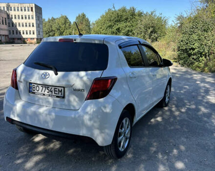 Белый Тойота Ярис, объемом двигателя 1 л и пробегом 68 тыс. км за 9200 $, фото 24 на Automoto.ua