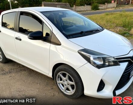 Белый Тойота Ярис, объемом двигателя 1.3 л и пробегом 240 тыс. км за 9000 $, фото 1 на Automoto.ua