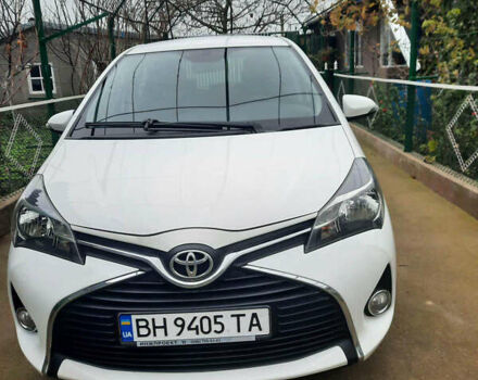 Белый Тойота Ярис, объемом двигателя 1.33 л и пробегом 61 тыс. км за 12000 $, фото 1 на Automoto.ua