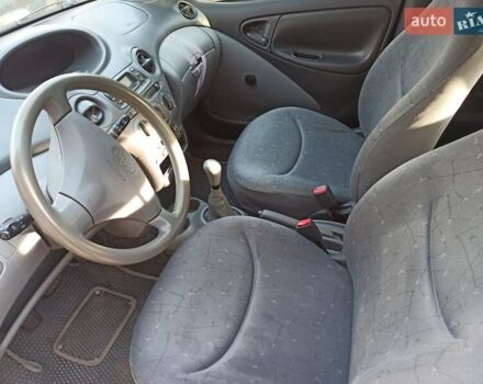 Бежевый Тойота Ярис, объемом двигателя 1.3 л и пробегом 206 тыс. км за 3600 $, фото 3 на Automoto.ua