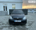 Черный Тойота Ярис, объемом двигателя 1.4 л и пробегом 287 тыс. км за 3700 $, фото 1 на Automoto.ua